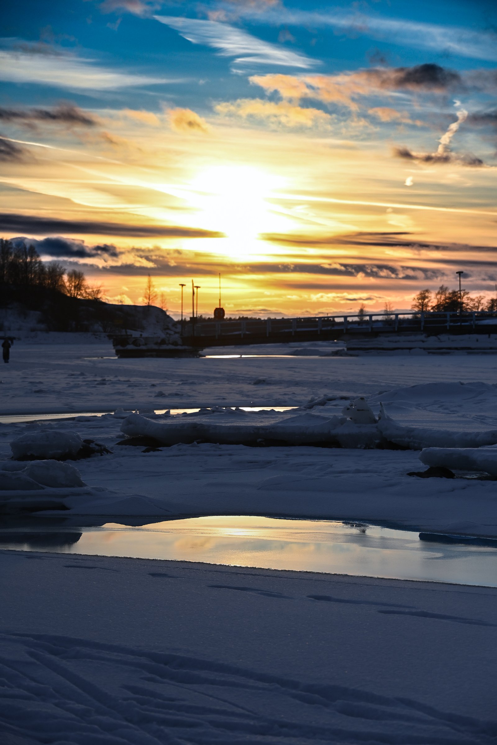 Winter harbor at sunset